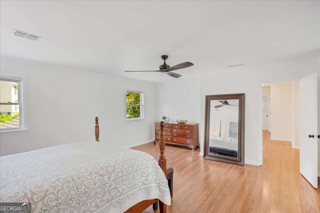 1380 Heritage Glen Dr, Marietta, GA 30068 - bedroom with light wood finished floors, baseboards, and a ceiling fan