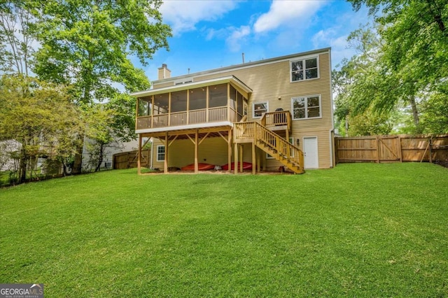 1380 Heritage Glen Dr, Marietta, GA 30068 - back of property featuring a sunroom, stairs, a chimney, a gate, and a deck