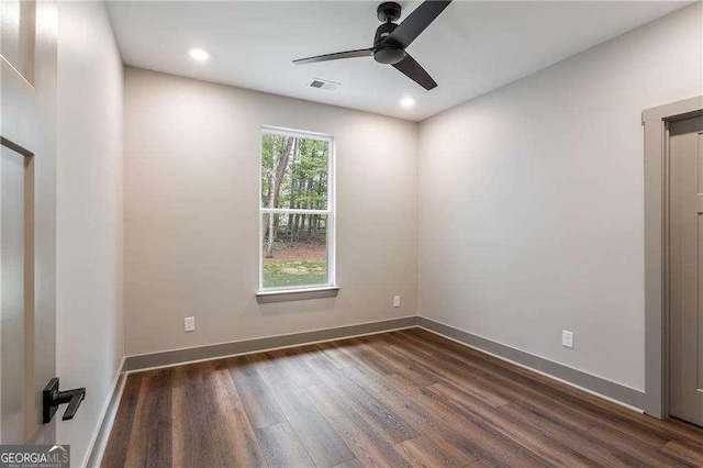 unfurnished room with a ceiling fan, dark wood finished floors, baseboards, and recessed lighting