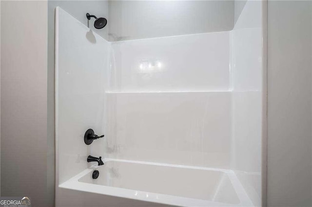 bathroom with shower / bathtub combination