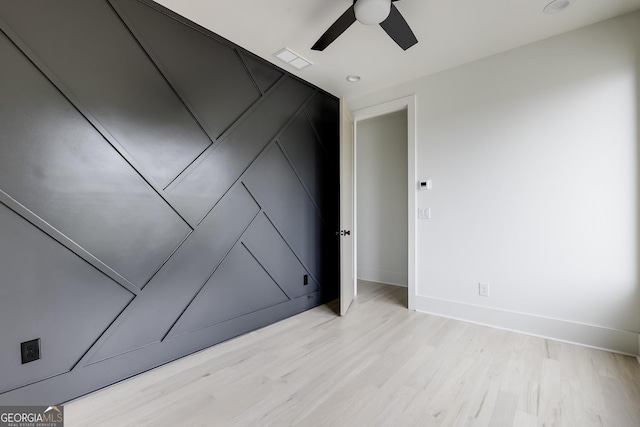 1968 8th St, Chamblee, GA 30341 - empty room with light wood-type flooring and a ceiling fan