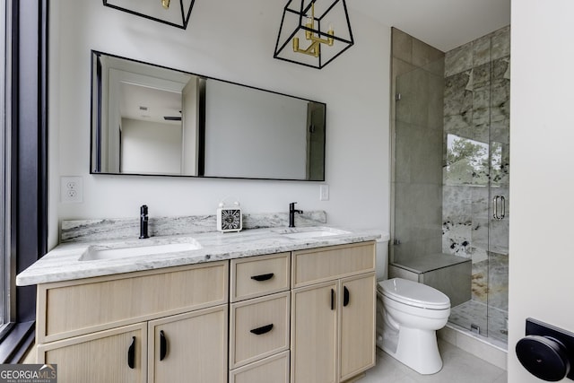 1968 8th St, Chamblee, GA 30341 - full bath featuring double vanity, a stall shower, and tile patterned floors
