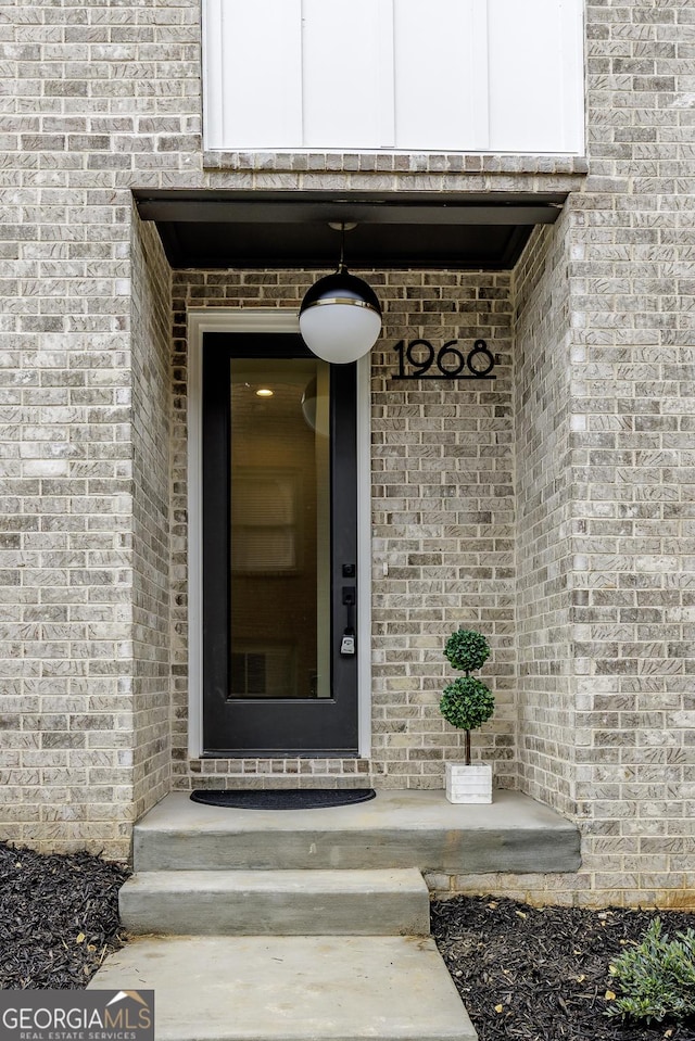 1968 8th St, Chamblee, GA 30341 - doorway to property with brick siding