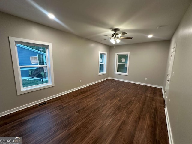 113 Sidetrack Cir, Comer, GA 30629 - spare room featuring a ceiling fan, dark wood-style flooring, and baseboards