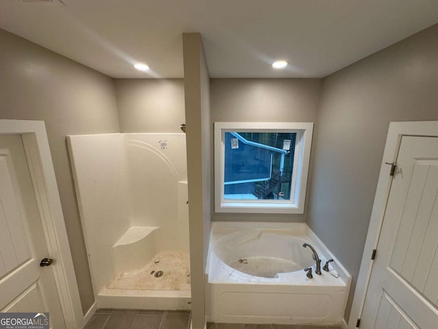 113 Sidetrack Cir, Comer, GA 30629 - bathroom with a garden tub, tile patterned floors, and a shower
