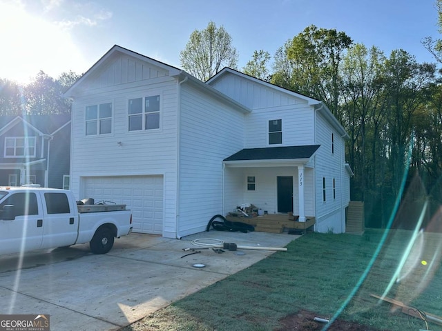 113 Sidetrack Cir, Comer, GA 30629 - view of front of house with a garage, board and batten siding, and concrete driveway