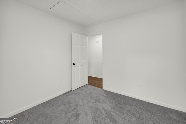 1645 Cobbs Creek Ln, Decatur, GA 30032 - carpeted spare room with attic access and baseboards