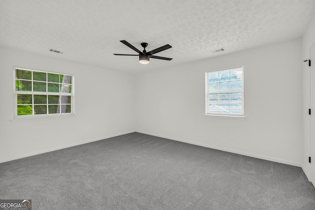 1645 Cobbs Creek Ln, Decatur, GA 30032 - spare room featuring carpet, ceiling fan, a textured ceiling, and baseboards