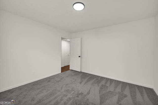 1645 Cobbs Creek Ln, Decatur, GA 30032 - unfurnished room with dark carpet and baseboards