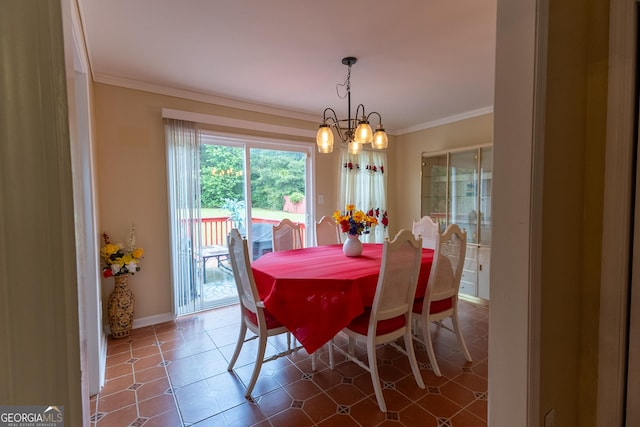 dining space with ornamental molding, a chandelier, and baseboards