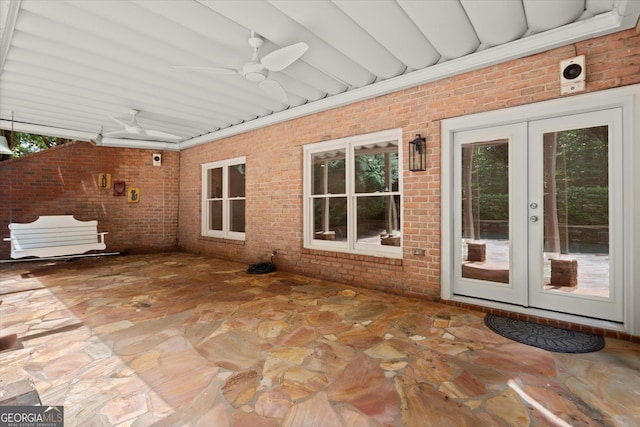 view of patio featuring french doors and ceiling fan