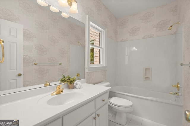 full bathroom featuring toilet, wallpapered walls, vanity, tile patterned flooring, and tub / shower combination