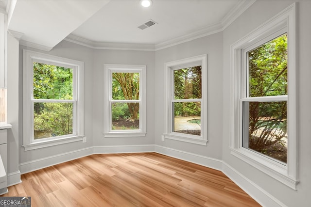 unfurnished sunroom featuring healthy amount of natural light