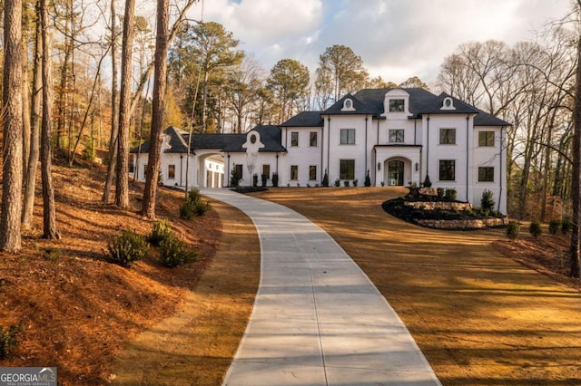 5211 Powers Ferry Rd, Sandy Springs, GA 30327 - french country inspired facade with driveway