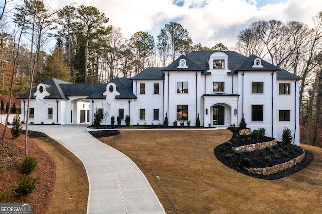 5211 Powers Ferry Rd, Sandy Springs, GA 30327 - french country style house featuring stucco siding and curved driveway
