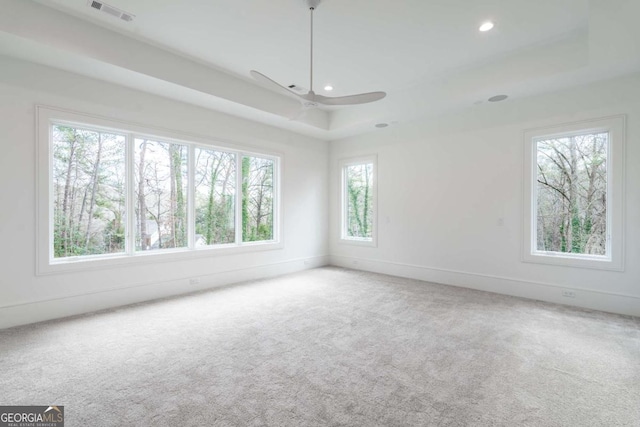 5211 Powers Ferry Rd, Sandy Springs, GA 30327 - carpeted spare room featuring a tray ceiling, a ceiling fan, recessed lighting, and baseboards