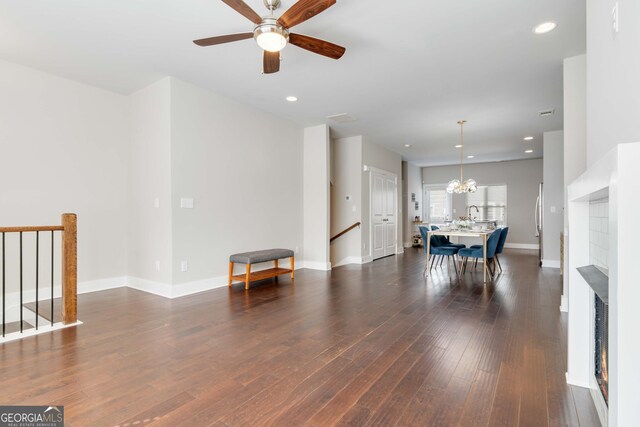 1405 Attwater Dr, Atlanta, GA 30316 - living room featuring dark wood-style flooring, baseboards, a ceiling fan, a chandelier, and recessed lighting