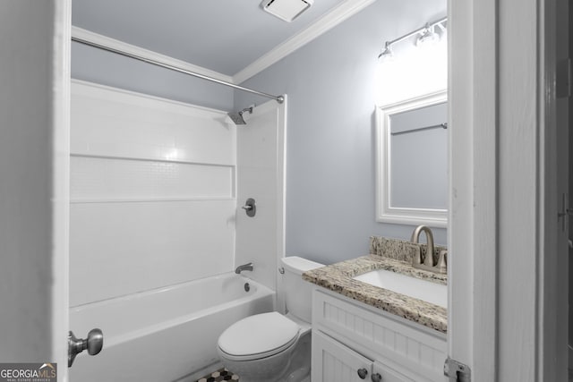 bathroom with toilet, crown molding, vanity, and shower / washtub combination