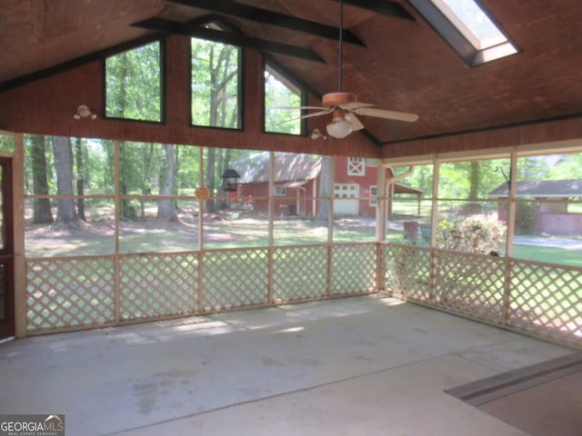 183 Goodwyn Rd, Newnan, GA 30265 - unfurnished sunroom with ceiling fan, a skylight, and lofted ceiling
