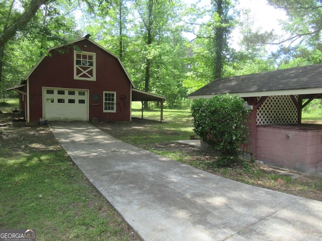 183 Goodwyn Rd, Newnan, GA 30265 - garage featuring concrete driveway and a detached garage