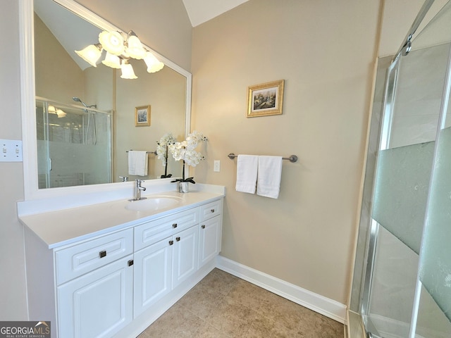 full bathroom with lofted ceiling, a shower stall, baseboards, and vanity