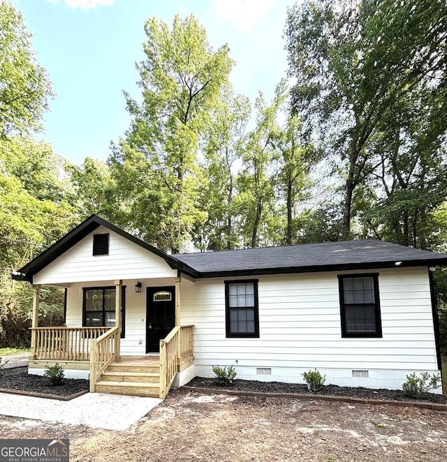 4516 Bon Ayer Cir, Macon, GA 31204 - view of front facade with crawl space, covered porch, and a shingled roof