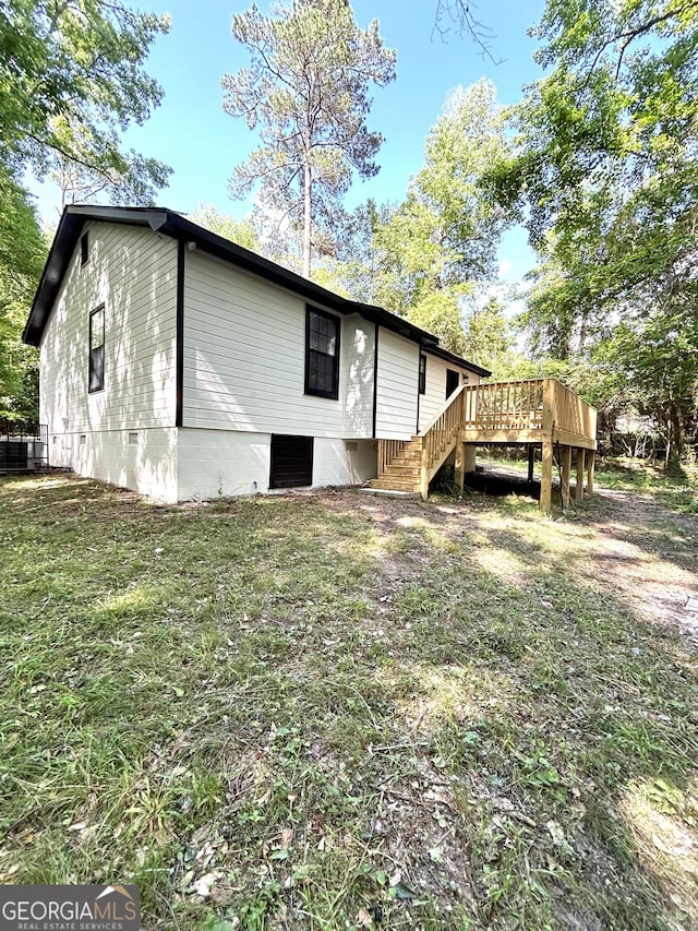 4516 Bon Ayer Cir, Macon, GA 31204 - back of property with a deck and stairs