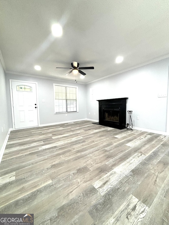 4516 Bon Ayer Cir, Macon, GA 31204 - unfurnished living room with crown molding, ceiling fan, baseboards, wood finished floors, and recessed lighting