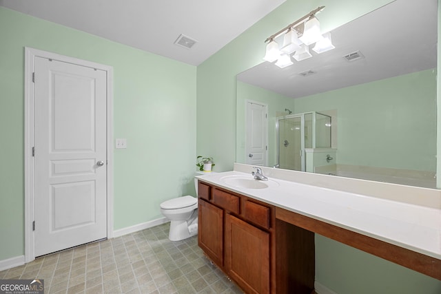 2656 Avanti Way, Decatur, GA 30035 - bathroom featuring a stall shower, baseboards, vanity, toilet, and tile patterned floors