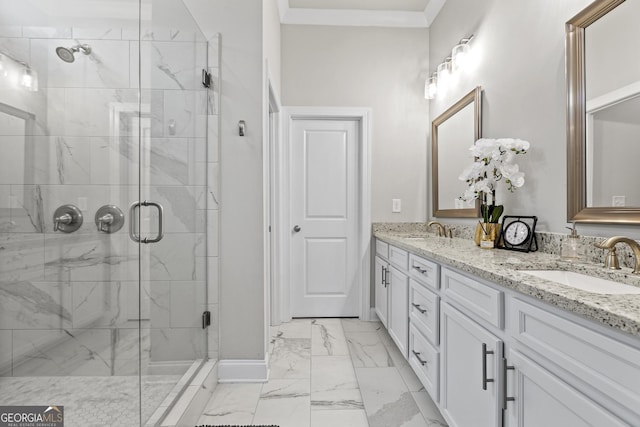 bathroom featuring marble finish flooring, baseboards, a stall shower, double vanity, and ornamental molding