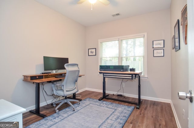 office with ceiling fan, wood finished floors, and baseboards