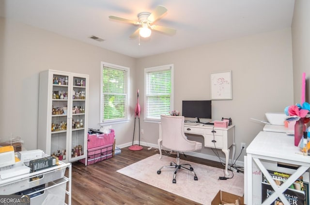 office area featuring ceiling fan, wood finished floors, and baseboards