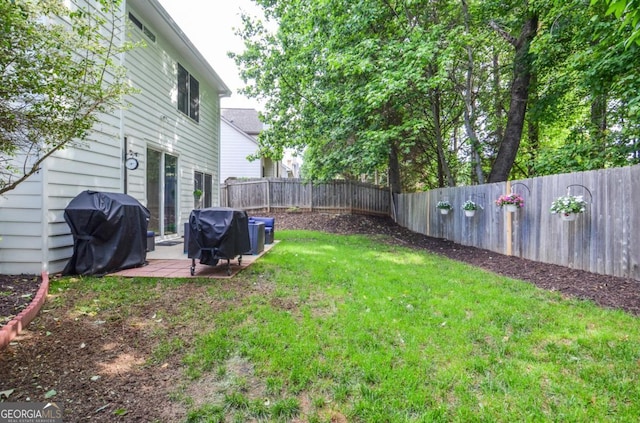 view of yard with a patio area