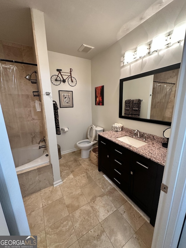 200 Renaissance Pkwy Unit 305, Atlanta, GA 30308 - bathroom with toilet, vanity, baseboards, and tiled shower / bath combo