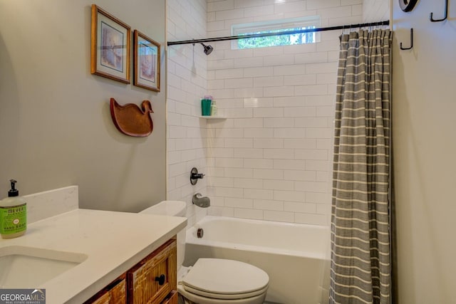 bathroom featuring shower / tub combo with curtain, toilet, and vanity