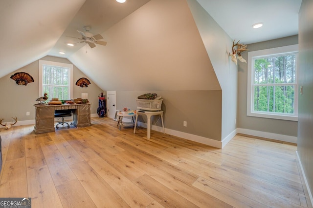 bonus room with light wood-style flooring, lofted ceiling, ceiling fan, baseboards, and recessed lighting