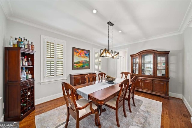 66 Mobile Ave NE, Atlanta, GA 30305 - dining room featuring baseboards, crown molding, dark wood-style flooring, and recessed lighting