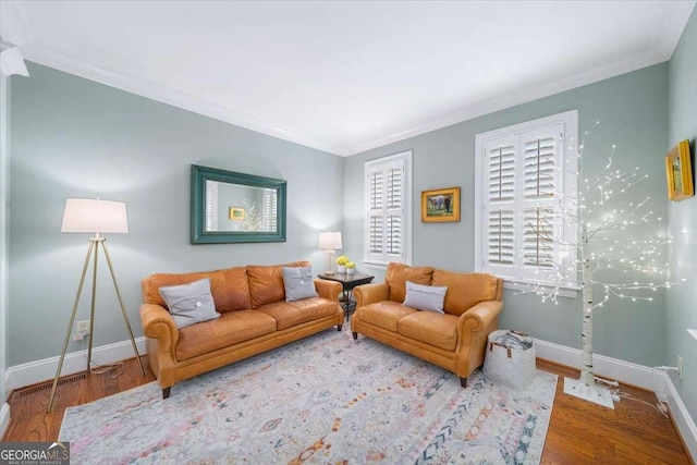 66 Mobile Ave NE, Atlanta, GA 30305 - living area with ornamental molding, baseboards, and wood finished floors