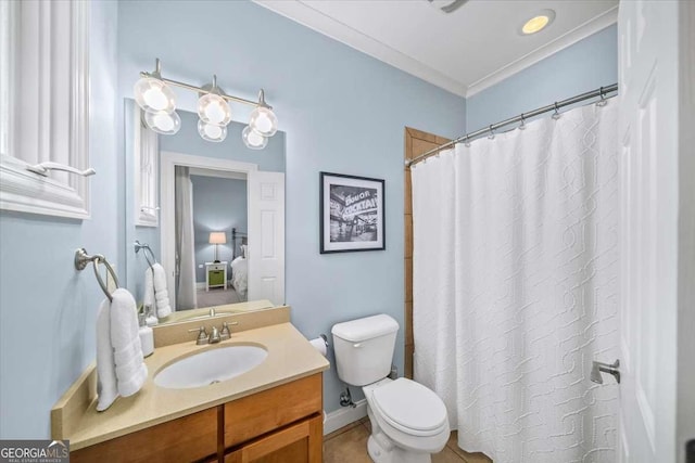 66 Mobile Ave NE, Atlanta, GA 30305 - bathroom featuring vanity, toilet, ornamental molding, and curtained shower