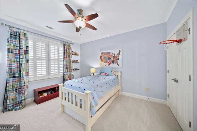 66 Mobile Ave NE, Atlanta, GA 30305 - bedroom with carpet flooring, baseboards, ornamental molding, and a ceiling fan
