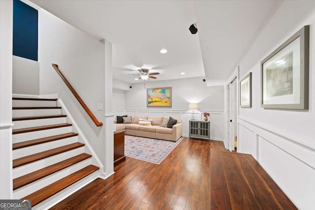 66 Mobile Ave NE, Atlanta, GA 30305 - living room with recessed lighting, a ceiling fan, wood finished floors, stairway, and a wainscoted wall