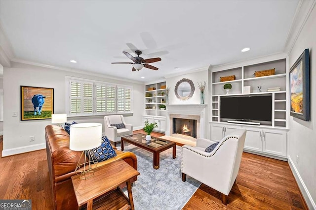 66 Mobile Ave NE, Atlanta, GA 30305 - living area featuring baseboards, ceiling fan, wood finished floors, crown molding, and recessed lighting