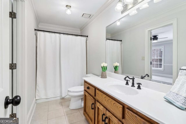 full bath featuring vanity, tile patterned floors, toilet, and crown molding