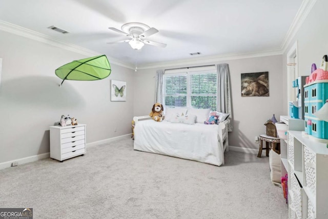 bedroom with ornamental molding, carpet, baseboards, and a ceiling fan