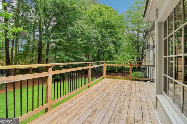 deck featuring a yard