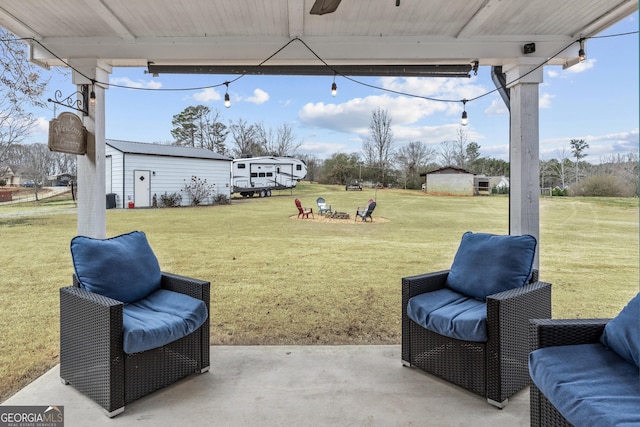 4739 Lower Jersey Rd, Oxford, GA 30054 - view of grassy yard with a patio, a ceiling fan, and an outdoor structure