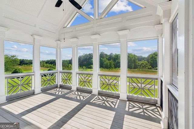 79 Gold Creek Ct, Dawsonville, GA 30534 - unfurnished sunroom with ceiling fan, lofted ceiling, view of scattered trees, and healthy amount of natural light