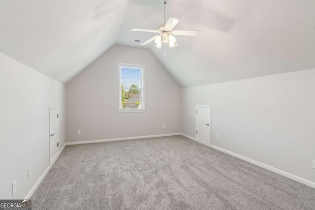 79 Gold Creek Ct, Dawsonville, GA 30534 - bonus room featuring vaulted ceiling, carpet floors, baseboards, and ceiling fan