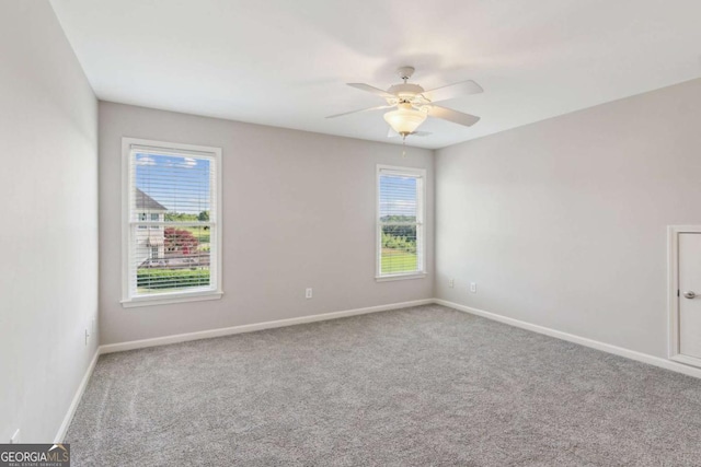 79 Gold Creek Ct, Dawsonville, GA 30534 - carpeted empty room featuring baseboards and ceiling fan