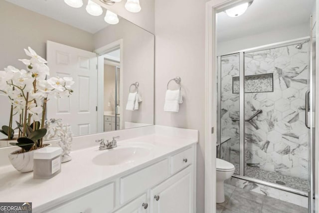 79 Gold Creek Ct, Dawsonville, GA 30534 - bathroom featuring marble finish flooring, a marble finish shower, toilet, and vanity